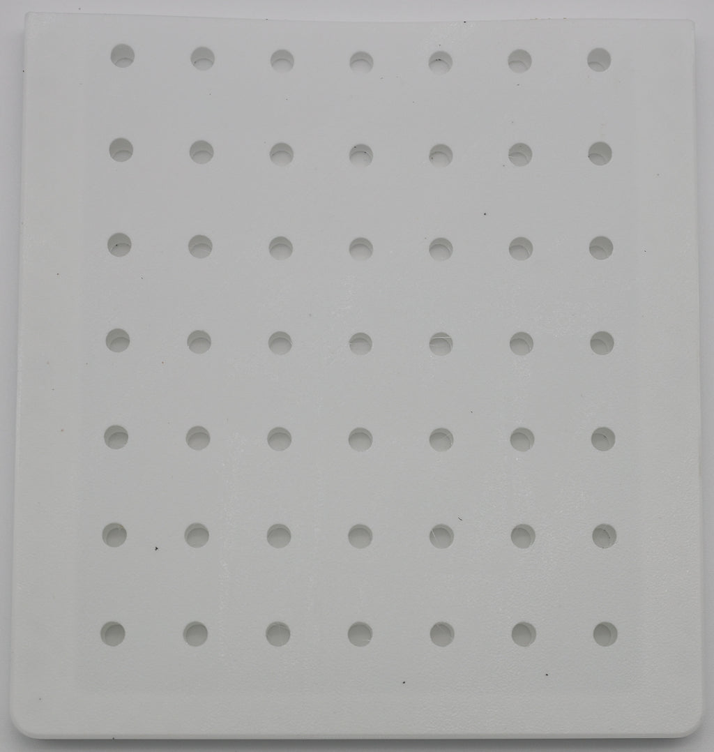 Battery separator close-up showing perforated structure for electrolyte flow
