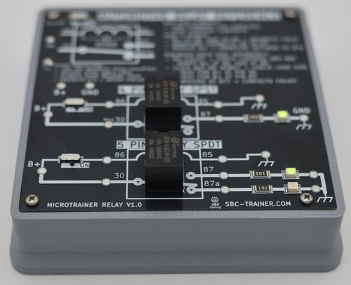 MicroTrainer Relay angled view showing 5-pin SPDT relay section with LEDs illuminated